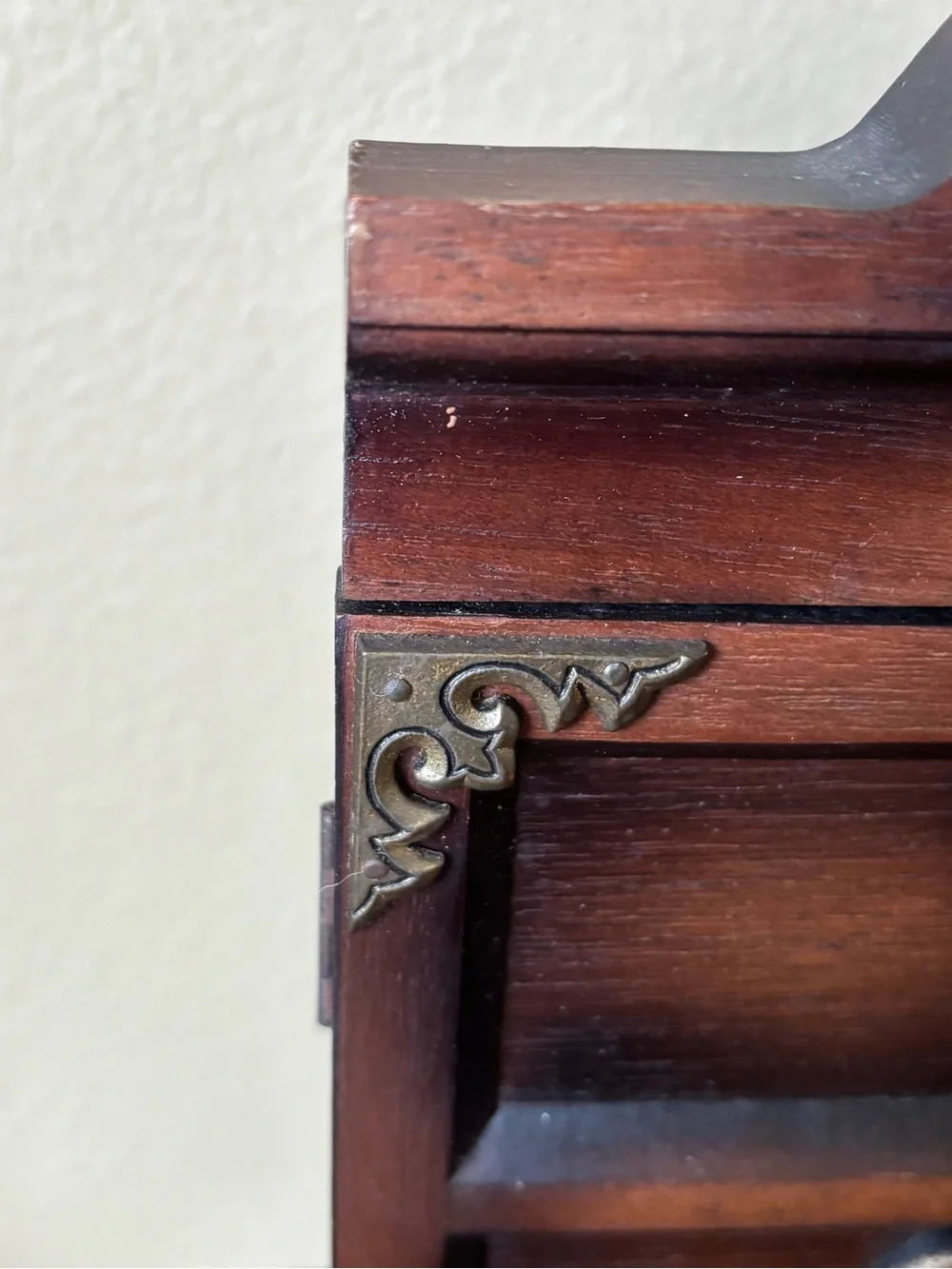 Antique wood jewelry box with drawers and metal hardware